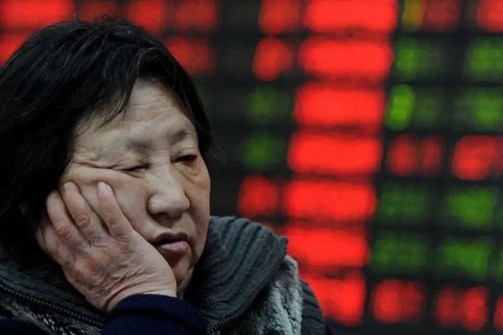 Índice Hang Seng, que concentra ações mais negociadas na China e em Hong Kong, negocia próximo às mínimas desde 2009 (Crédito Foto: Mark Ralston/Getty Images) (Mark Ralston/AFP/Getty Images)