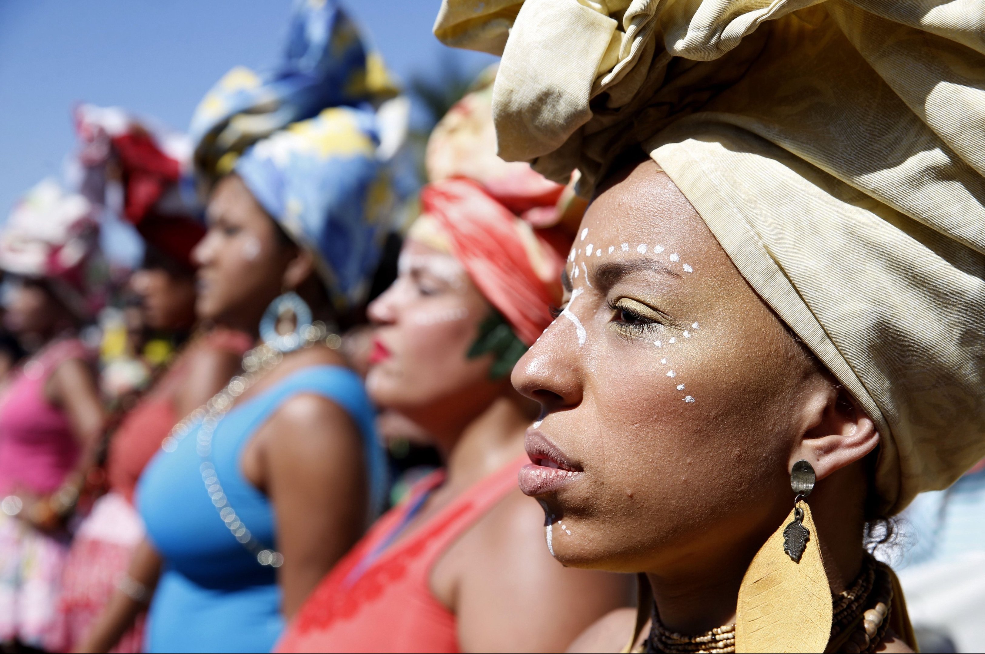 Mulheres marcham em Copacabana para celebrar dia da Mulher Negra Latino-americana e Caribenha durante a 3ª Marcha das Mulheres Negras no Centro do Mundo