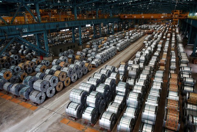 Rolls of steel are stacked inside the China Steel Corporation factory in Kaohsiung