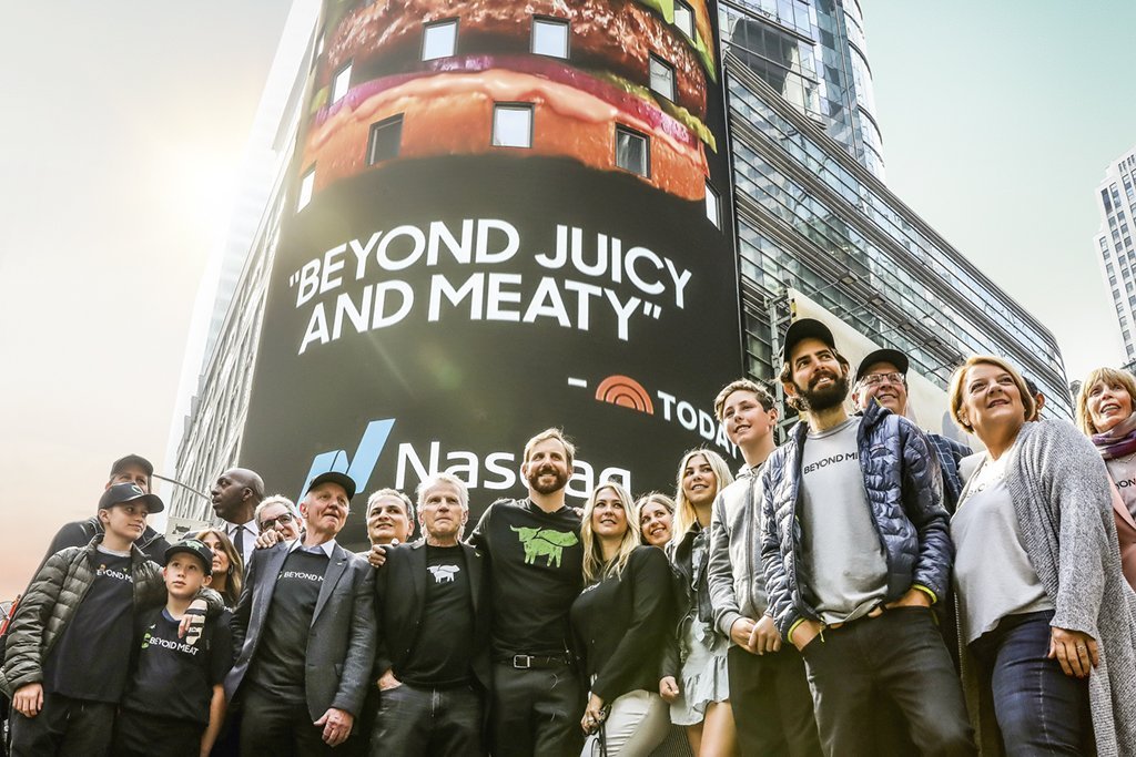 Ethan Brown, founder and CEO of Beyond Meat, poses with company executives and guests during the company’s IPO at the Nasdaq Market site in New York