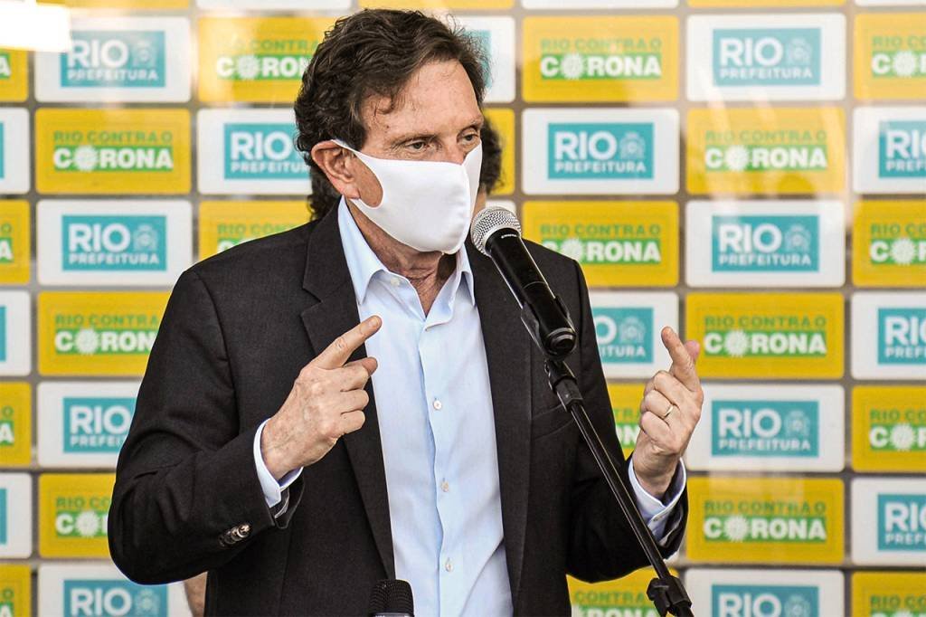 O prefeito Marcelo Crivella concede coletiva de imprensa, no Riocentro no Rio de Janeiro (RJ), nesta segunda-feira (25). Dentre os assuntos pautados estavam a possbilidade de liberação de clubes de futebol, onde foi acordado com os mesmos que a abetura se dará em junho, ficando funcionando apenas os serviços de fisioterapia dos clubes, e a possibilidade de abertura de algumas atividades comerciais conforme a curva da pandemia da Covid-19, do novo coronavírus, diminua.