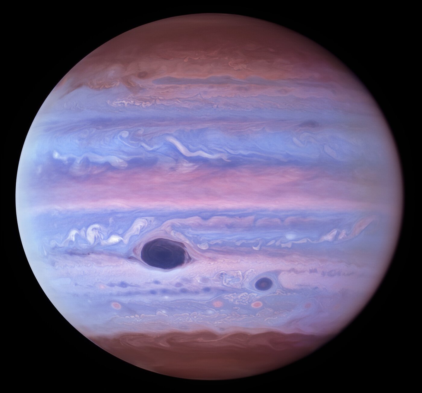 Júpiter em comprimento de onda ultravioleta, em imagem captada pelo telescópio Hubble.