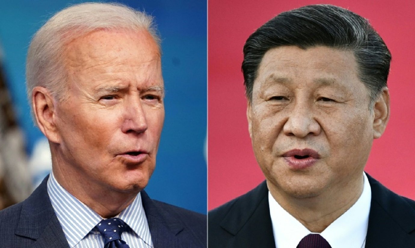 Os presidentes dos EUA, Joe Biden (E), e da China, Xi Jinping (D)